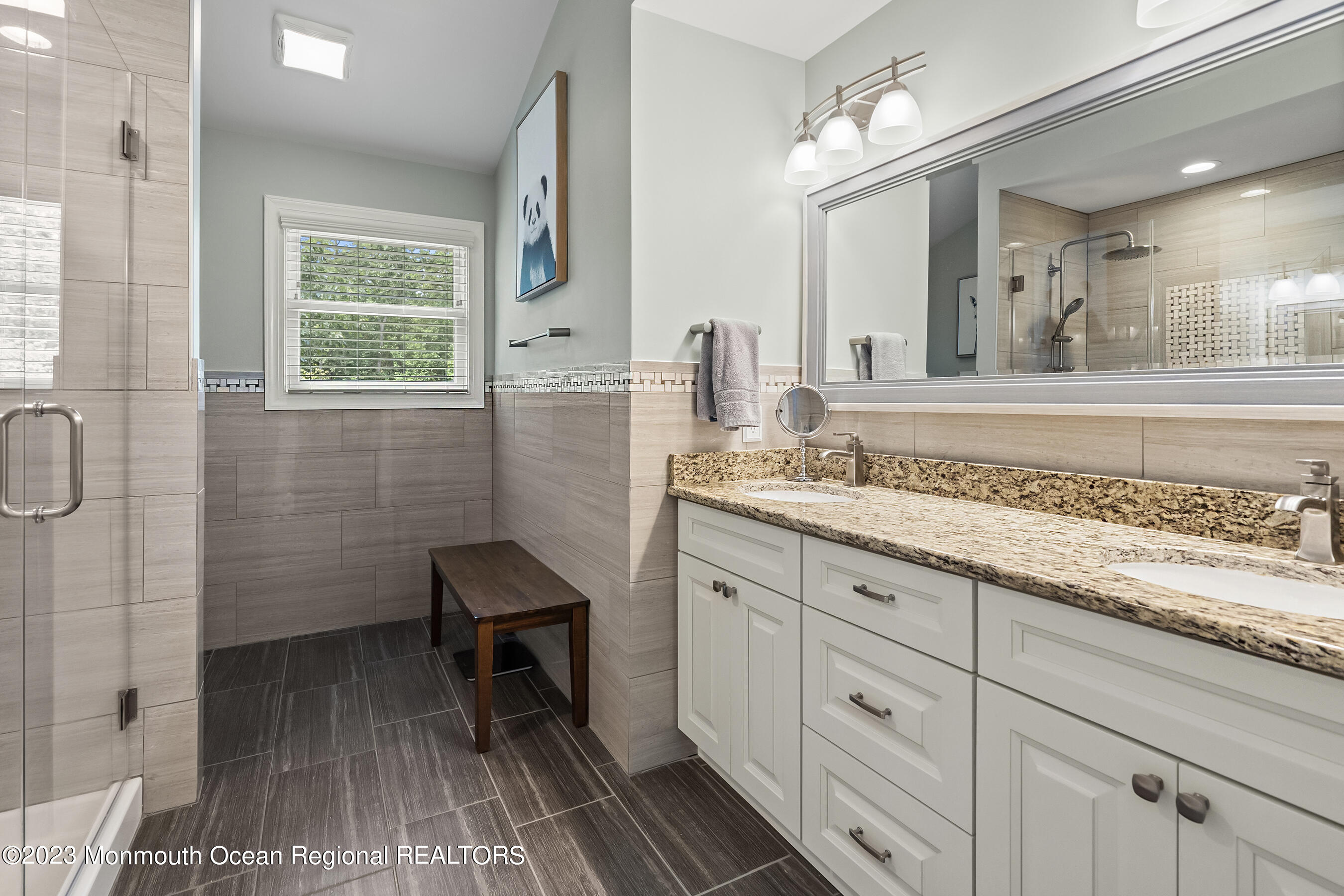 108 Wiseman Road Jackson, NJ 08527 - Photo 21 of 42 a spacious bathroom with a granite countertop sink a toilet and a mirror
