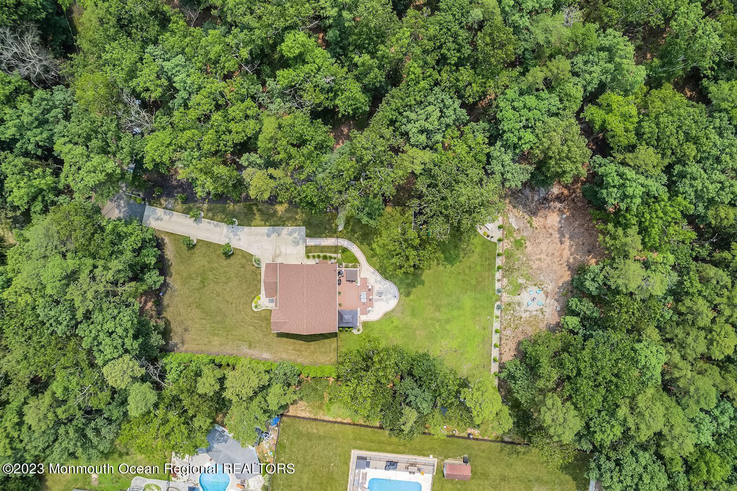 108 Wiseman Road Jackson, NJ 08527 - Photo 4 of 42 an aerial view of a house with a yard