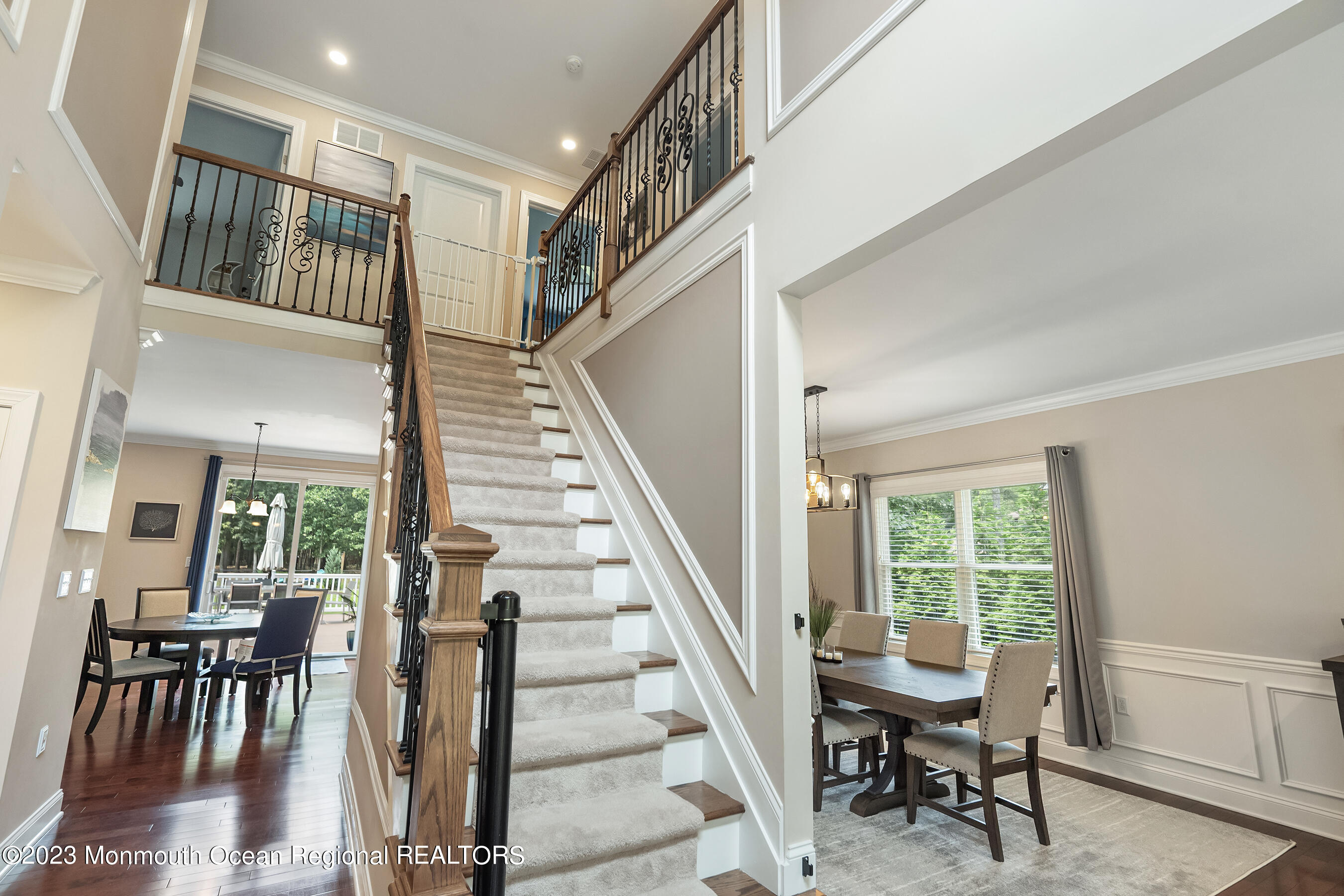 108 Wiseman Road Jackson, NJ 08527 - Photo 6 of 42 a view of entryway and dining room with wooden floor