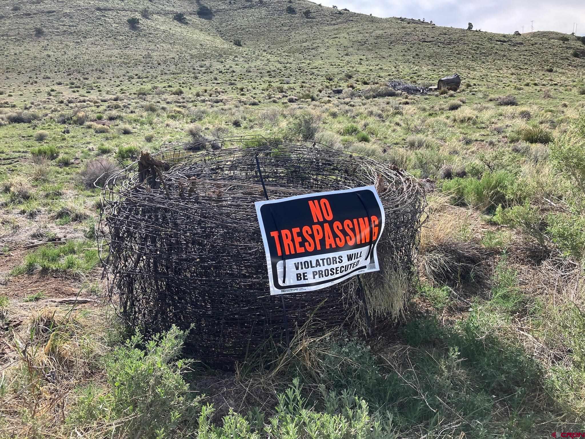 Tbd Tbd Spruce Street Del Norte, CO 81132 - Photo 21 of 44 a sign that is on a brick wall