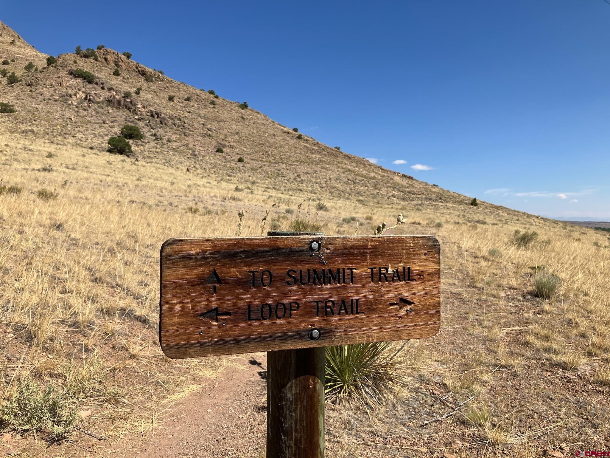 Tbd Tbd Spruce Street Del Norte, CO 81132 - Photo 22 of 44 a view of a fireplace with a mountain