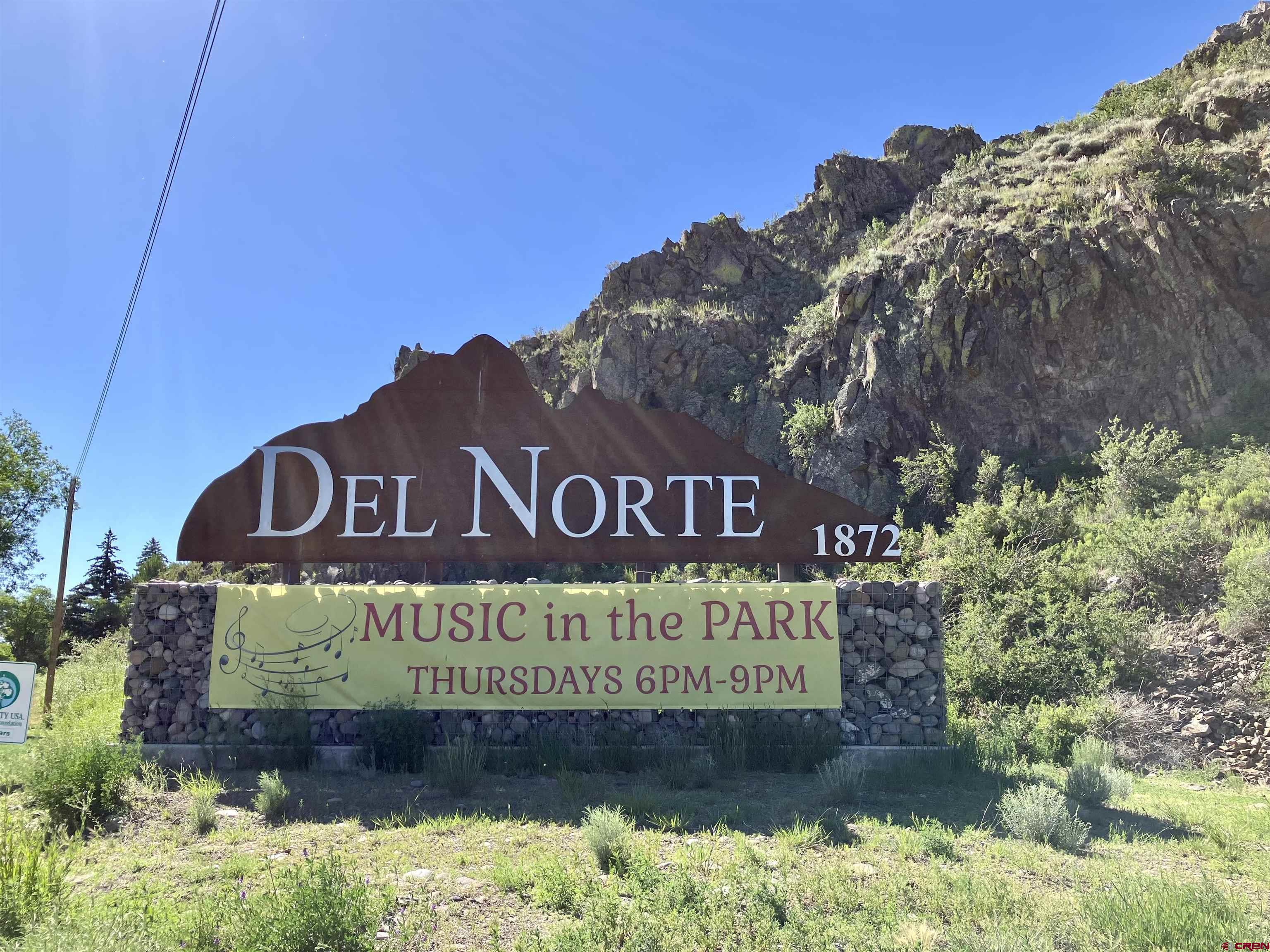 Tbd Tbd Spruce Street Del Norte, CO 81132 - Photo 31 of 44 a sign on the side of the road