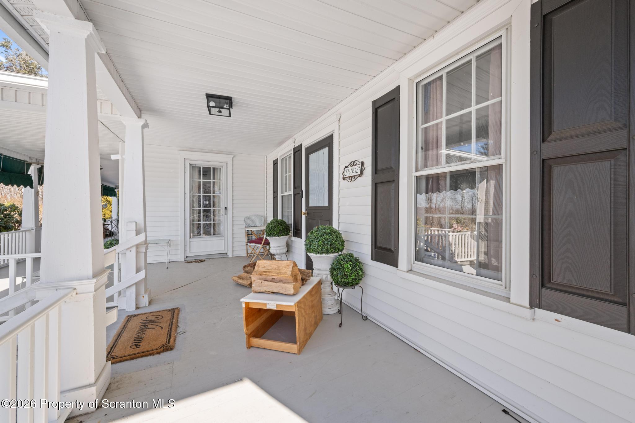 502 Gravel Pond Road Clarks Summit, PA 18411 - Photo 11 of 91 a living room with furniture and a window