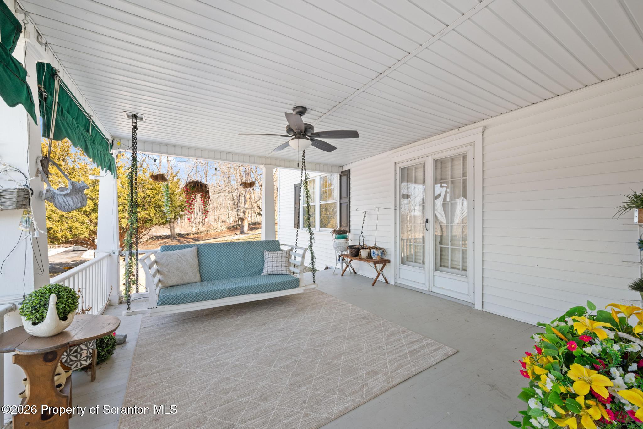 502 Gravel Pond Road Clarks Summit, PA 18411 - Photo 14 of 91 a outdoor space with lots of furniture and garden