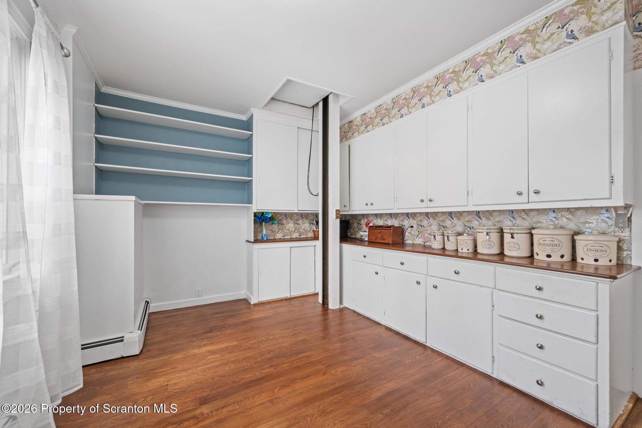 502 Gravel Pond Road Clarks Summit, PA 18411 - Photo 21 of 91 a kitchen with granite countertop white cabinets and white appliances