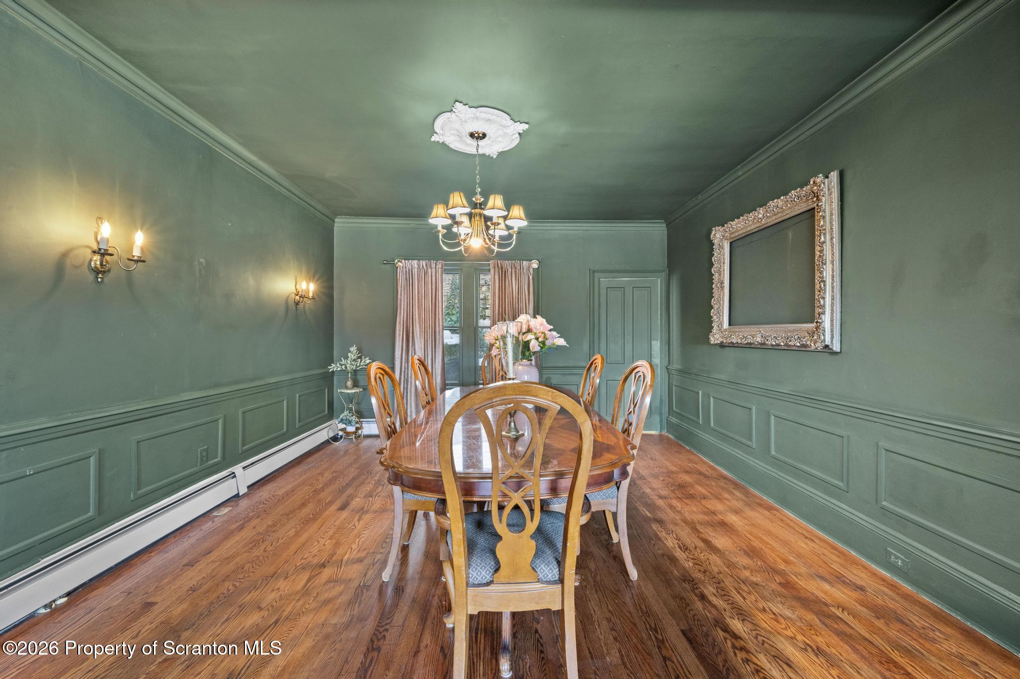 502 Gravel Pond Road Clarks Summit, PA 18411 - Photo 38 of 91 a view of a dining room with furniture and chandelier