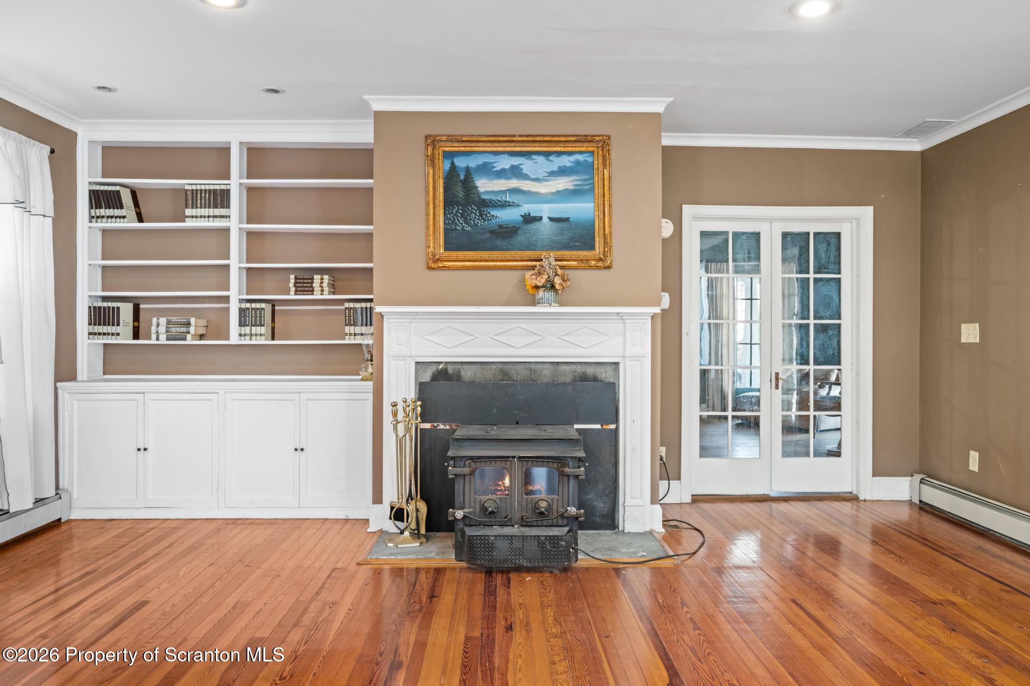 502 Gravel Pond Road Clarks Summit, PA 18411 - Photo 45 of 91 a view of a livingroom with a fireplace and window