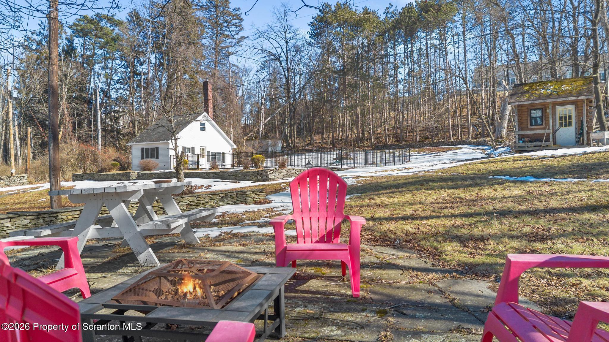 502 Gravel Pond Road Clarks Summit, PA 18411 - Photo 78 of 91 a view of swimming pool with a yard and seating area
