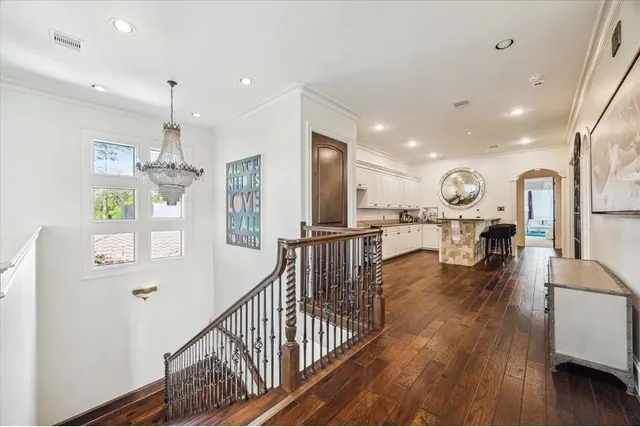 a view of kitchen with furniture and wooden floor