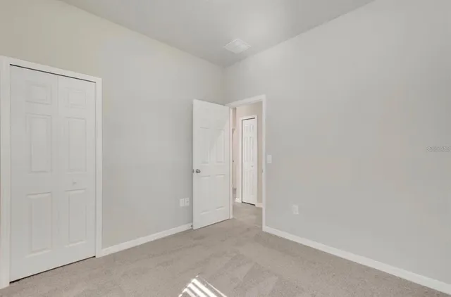 a view of an empty room with window