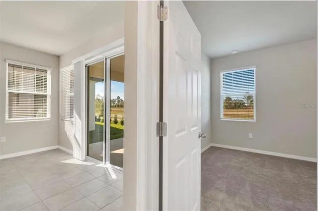 an empty room with windows