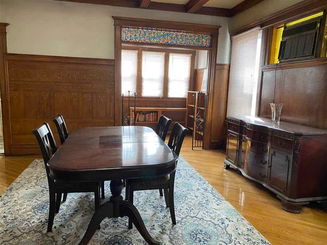 a view of a dining room with furniture