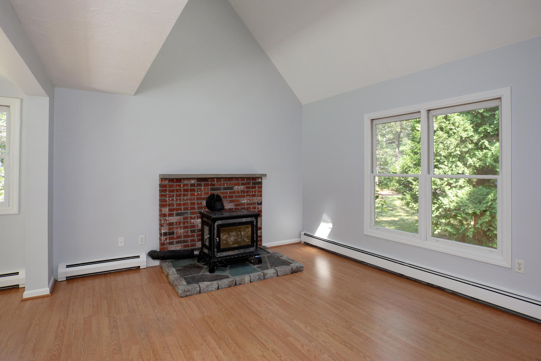215 Simon Narrows Road Mashpee, MA 02649 - Photo 3 of 20 a view of room with window and hardwood floor