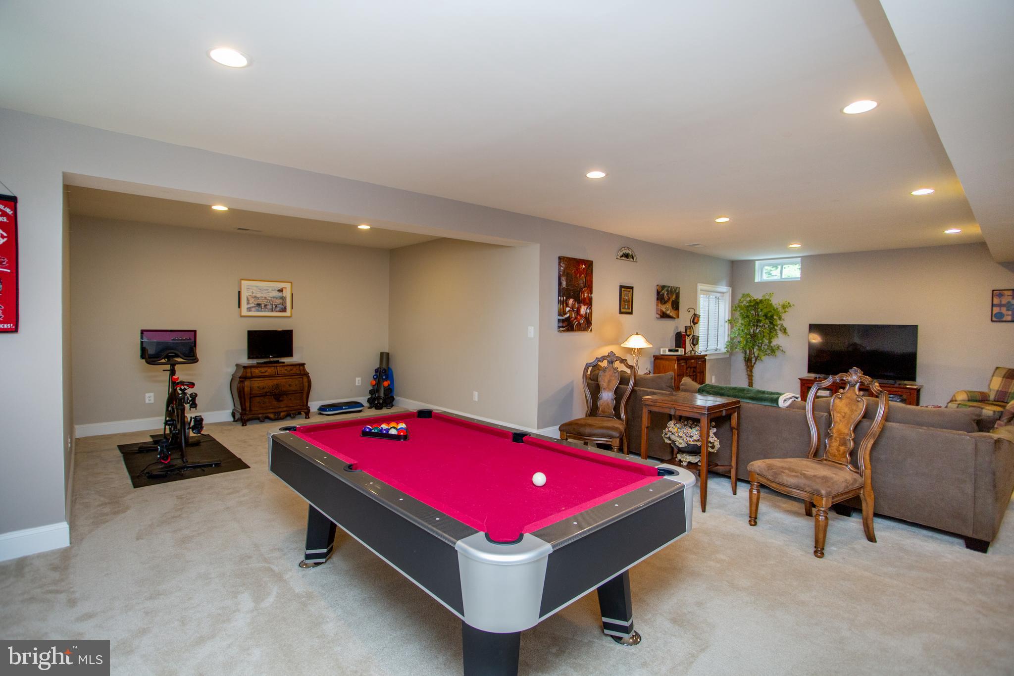 4682 Plough Tavern Road Doylestown, PA 18902 - Photo 34 of 42 a living room with furniture pool table and windows