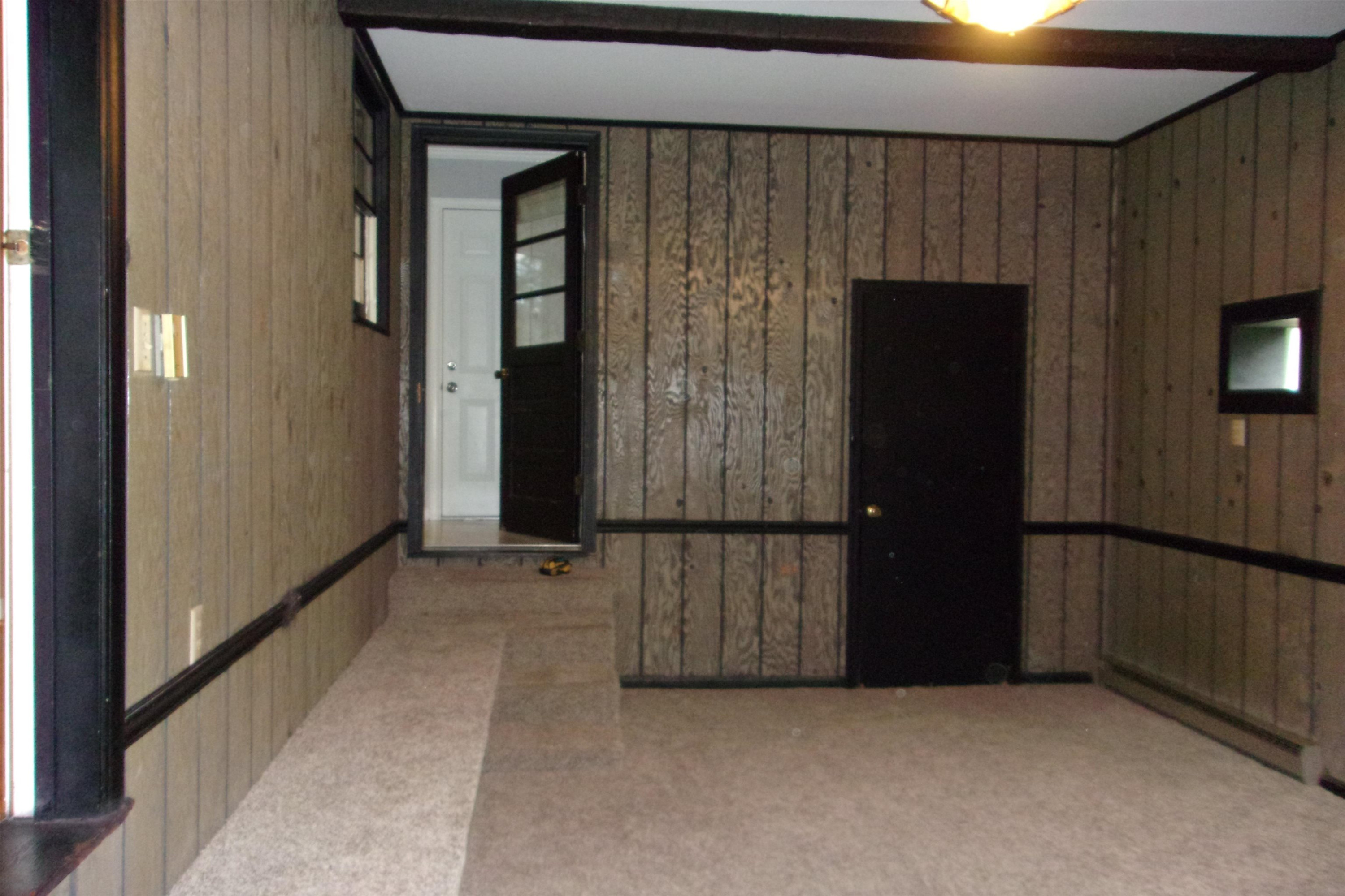 5232 Guess Road Durham, NC 27712 - Photo 5 of 17 a view of backyard with hallway