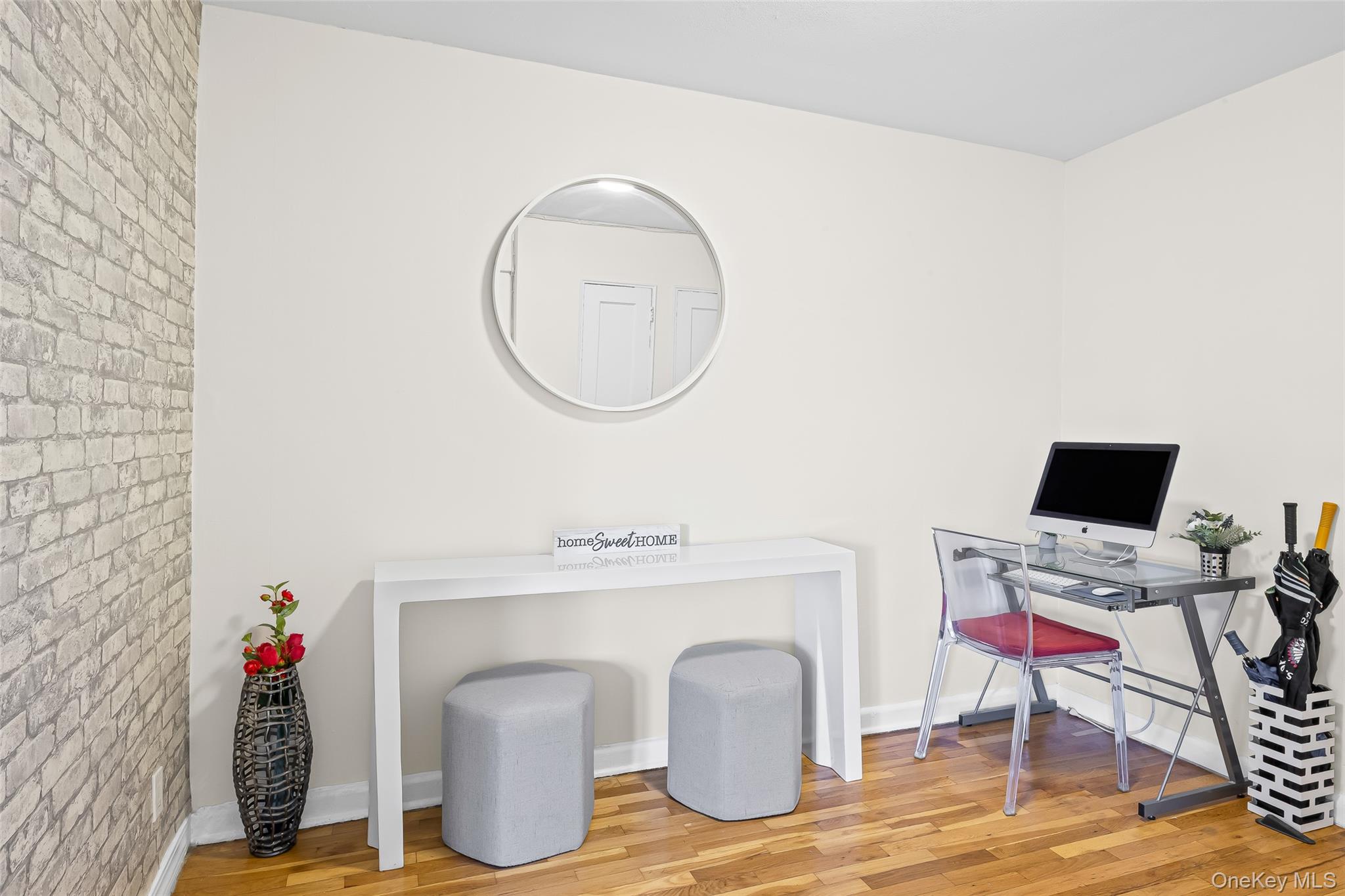 147-10 84th Road, Unit 4G Queens, NY 11435 - Photo 6 of 13 Office space featuring wood finished floors and brick wall