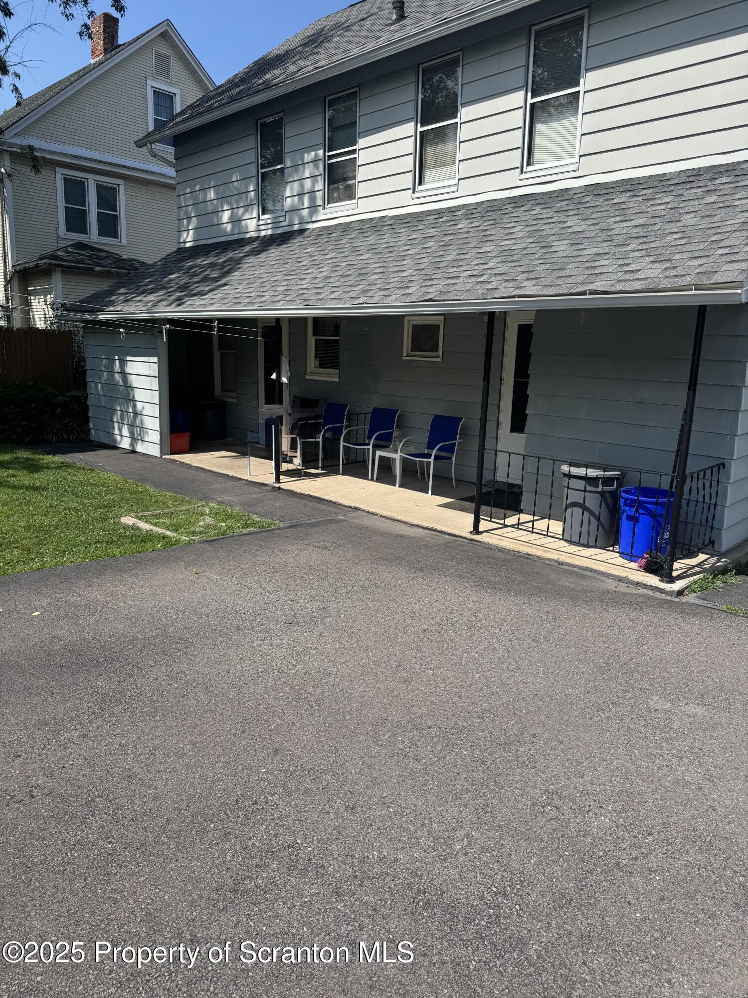 205-207 Spring Street Scranton, PA 18508 - Photo 7 of 40 Large cover back porch