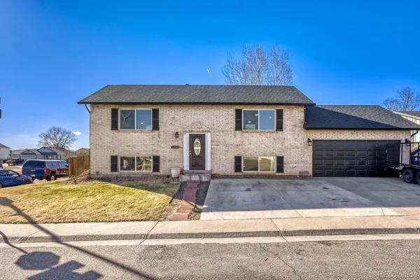 a view of a house with snow on roof