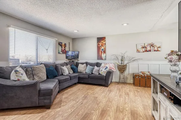 a living room with furniture and a couch
