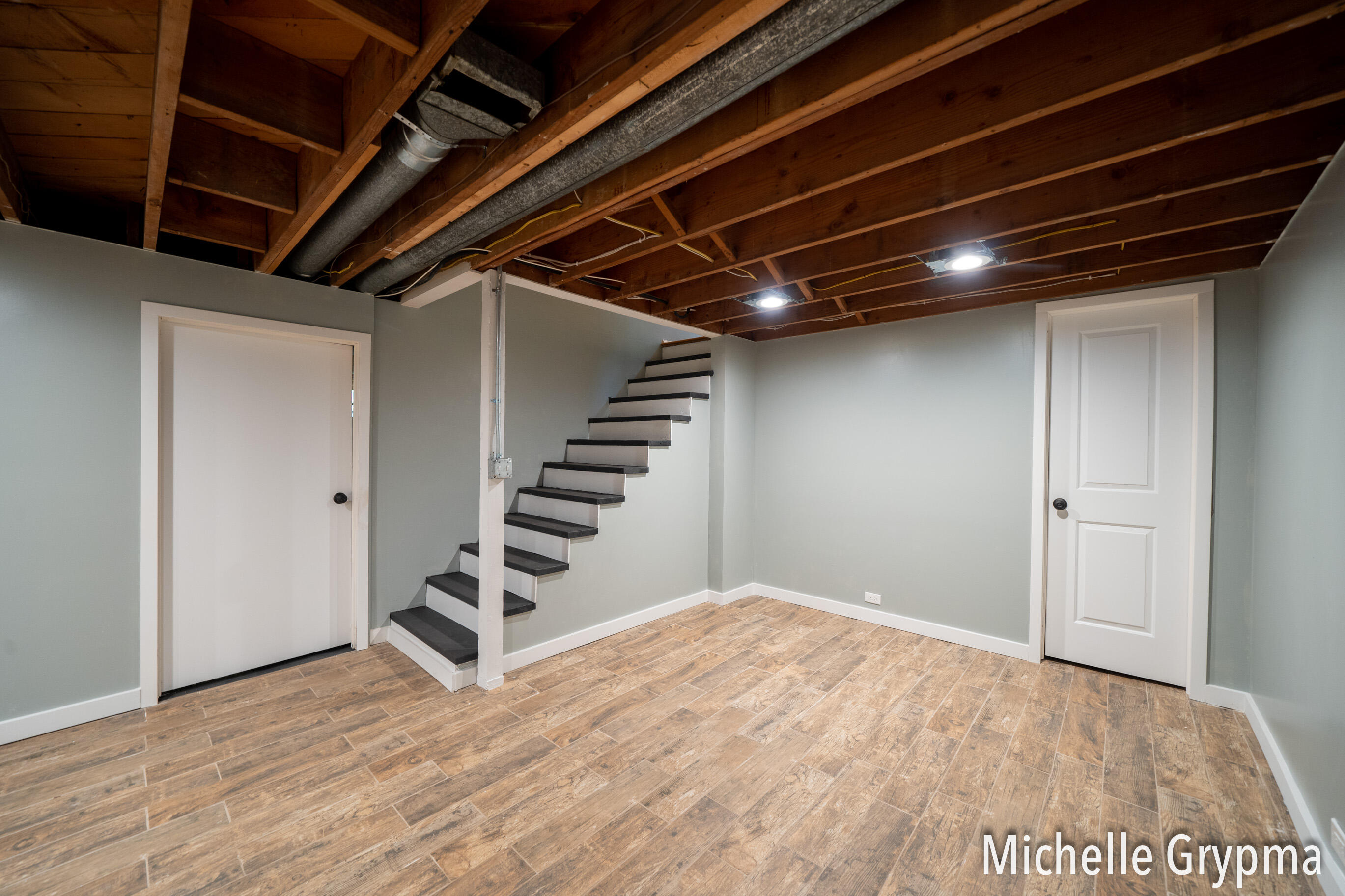 6084 Cascade Road Southeast Grand Rapids, MI 49546 - Photo 22 of 46 Basement stairs