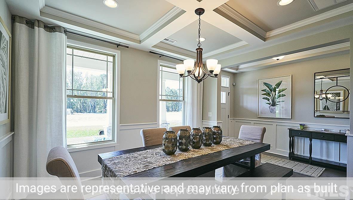 7704 Calcutta Drive Willow Spring, NC 27592 - Photo 3 of 30 a living room with large window
