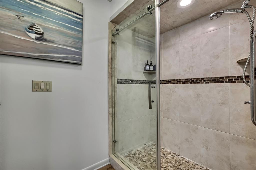 2919 North Rivers Edge Boulevard, Unit 2919 Crystal River, FL 34429 - Photo 22 of 36 a bathroom with a shower