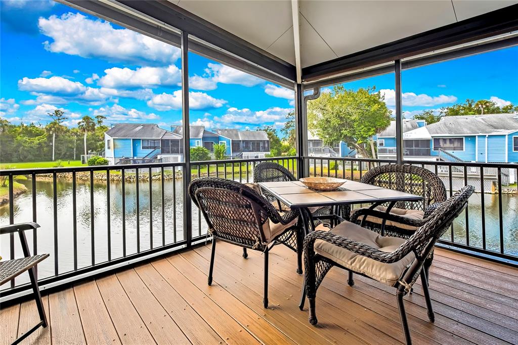 2919 North Rivers Edge Boulevard, Unit 2919 Crystal River, FL 34429 - Photo 26 of 36 a view of a chairs and table in the balcony