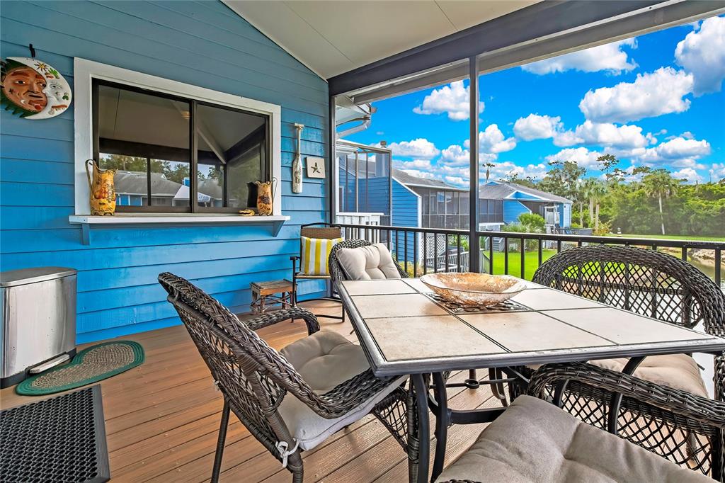2919 North Rivers Edge Boulevard, Unit 2919 Crystal River, FL 34429 - Photo 27 of 36 a view of a chairs and table in the patio