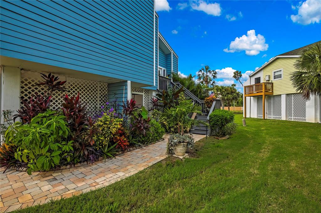 2919 North Rivers Edge Boulevard, Unit 2919 Crystal River, FL 34429 - Photo 32 of 36 a front view of a house with a yard
