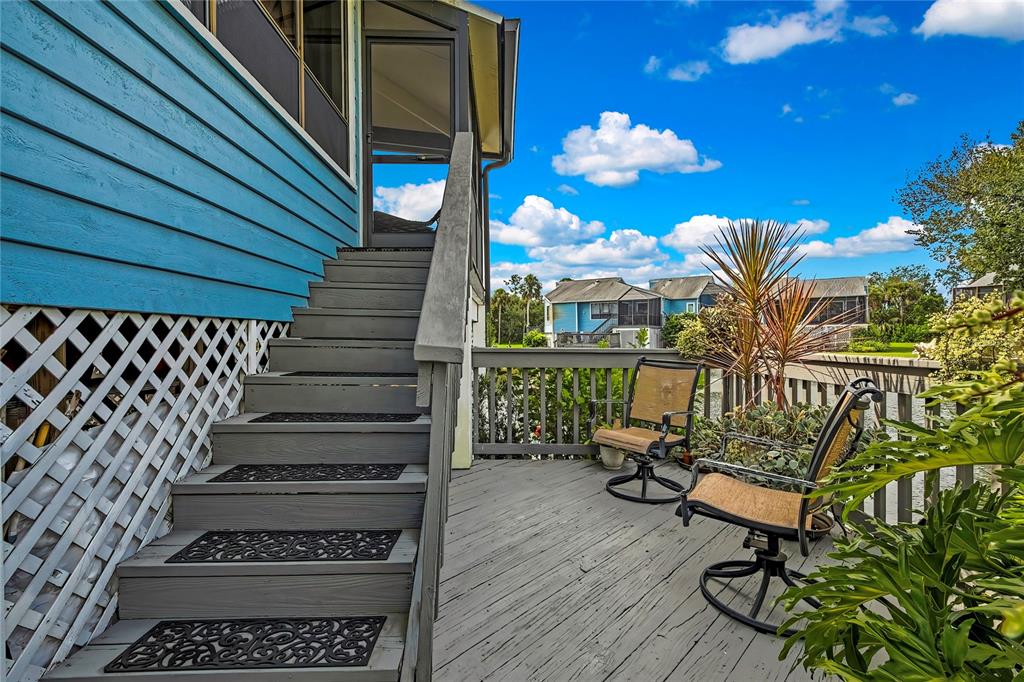 2919 North Rivers Edge Boulevard, Unit 2919 Crystal River, FL 34429 - Photo 33 of 36 a view of a balcony with chairs