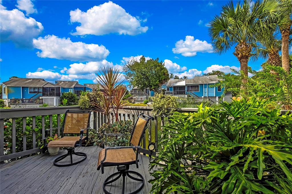 2919 North Rivers Edge Boulevard, Unit 2919 Crystal River, FL 34429 - Photo 34 of 36 a view of a balcony with chairs