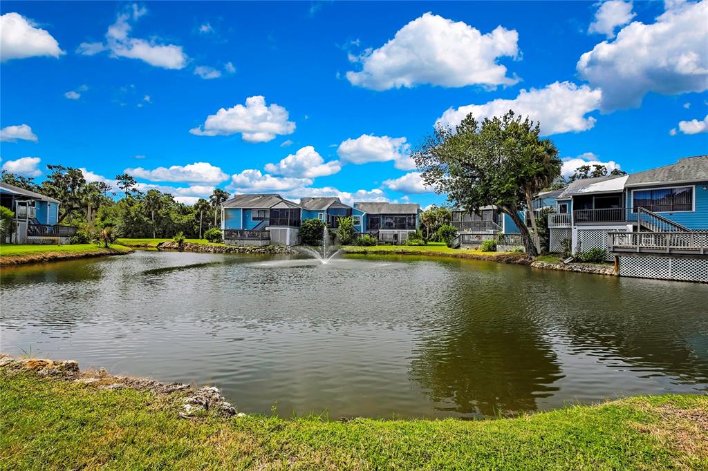 2919 North Rivers Edge Boulevard, Unit 2919 Crystal River, FL 34429 - Photo 36 of 36 a view of a lake with houses