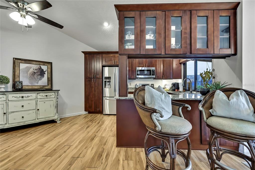2919 North Rivers Edge Boulevard, Unit 2919 Crystal River, FL 34429 - Photo 9 of 36 a dining room with furniture and window