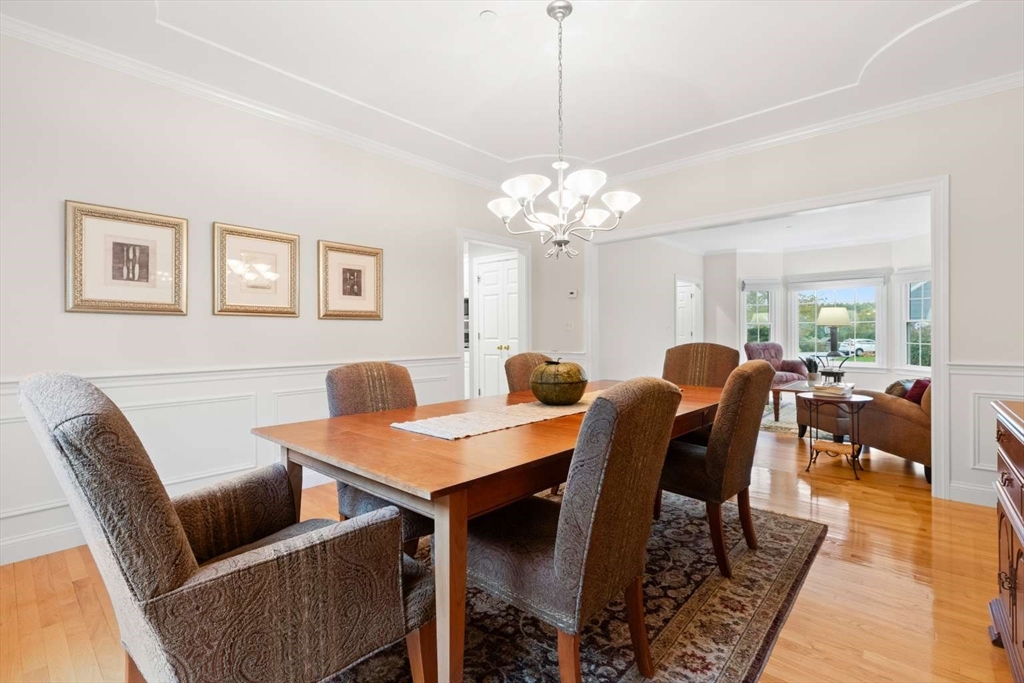 85 Windkist Farm Road North Andover, MA 01845 - Photo 11 of 20 a view of a dining room with furniture and wooden floor