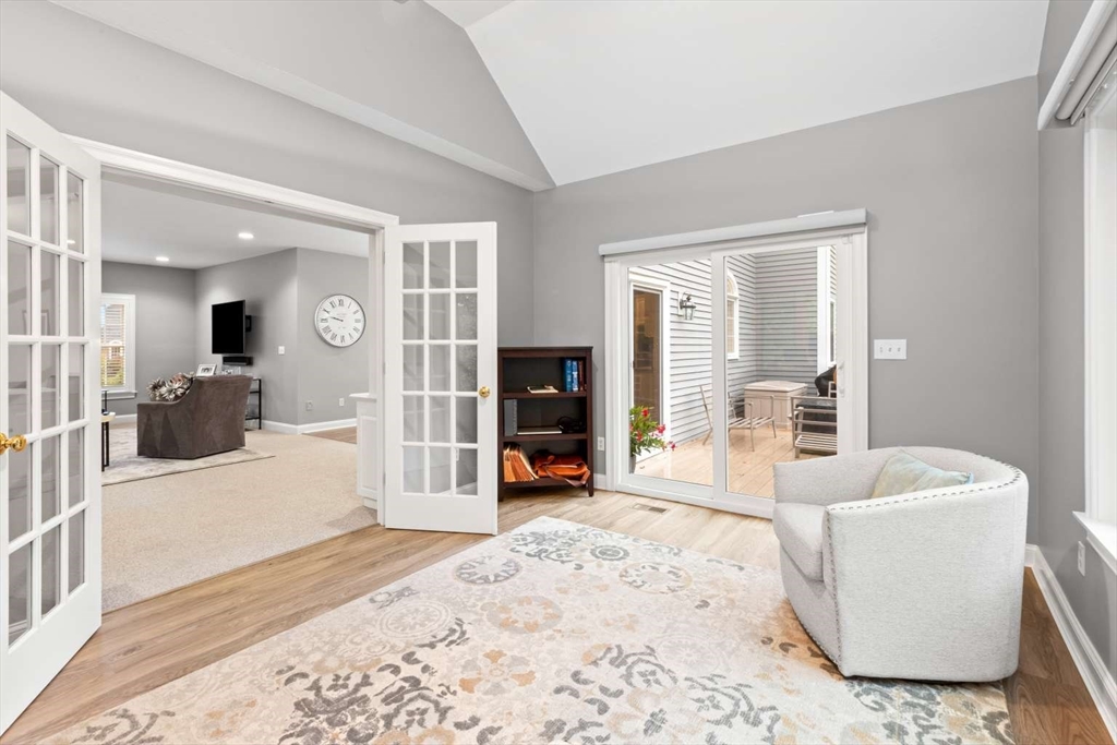 85 Windkist Farm Road North Andover, MA 01845 - Photo 12 of 20 a living room with furniture and a fireplace