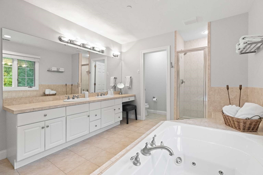 85 Windkist Farm Road North Andover, MA 01845 - Photo 16 of 20 a spacious bathroom with a tub sink and mirror
