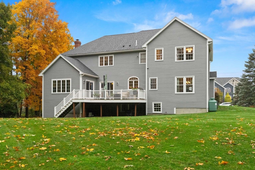85 Windkist Farm Road North Andover, MA 01845 - Photo 2 of 20 a front view of house with yard and green space