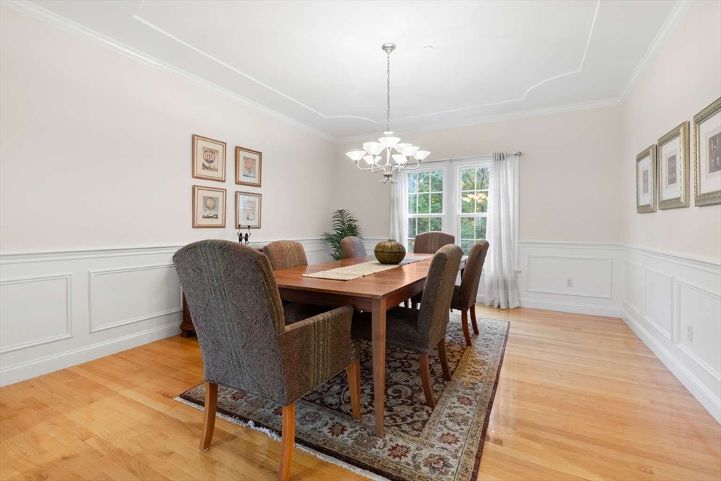 85 Windkist Farm Road North Andover, MA 01845 - Photo 9 of 20 a view of a dining room with furniture and chandelier