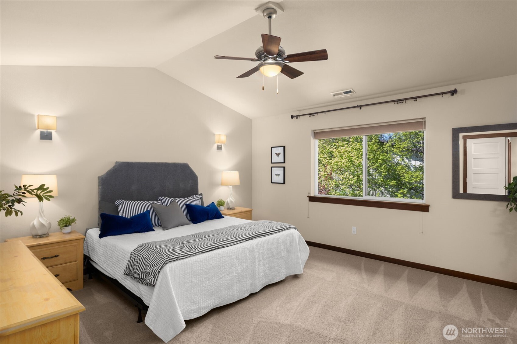 4610 Maltby Road Bothell, WA 98021 - Photo 17 of 39 a bedroom with a bed and window