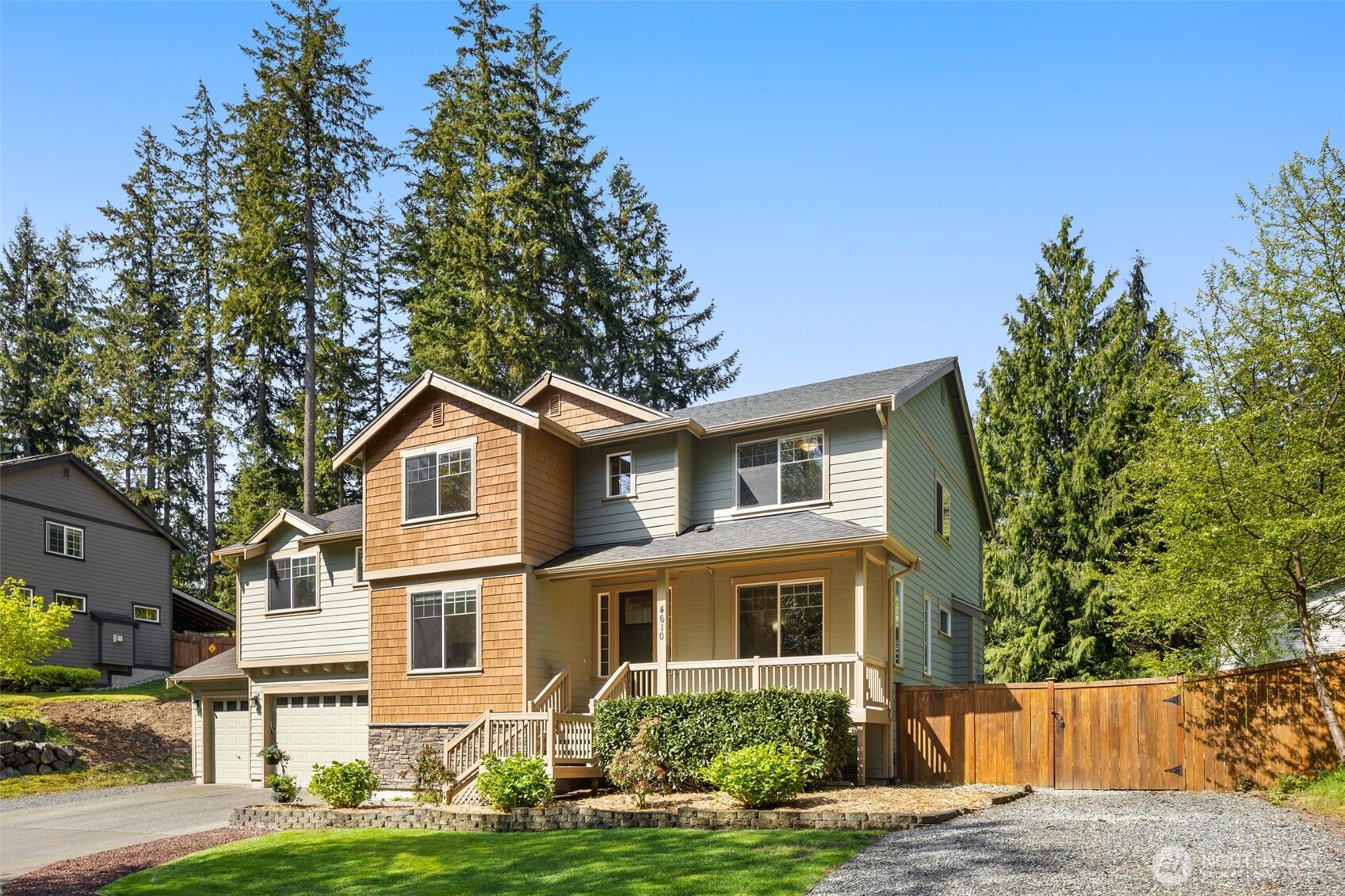 4610 Maltby Road Bothell, WA 98021 - Photo 2 of 39 a front view of a house with garden