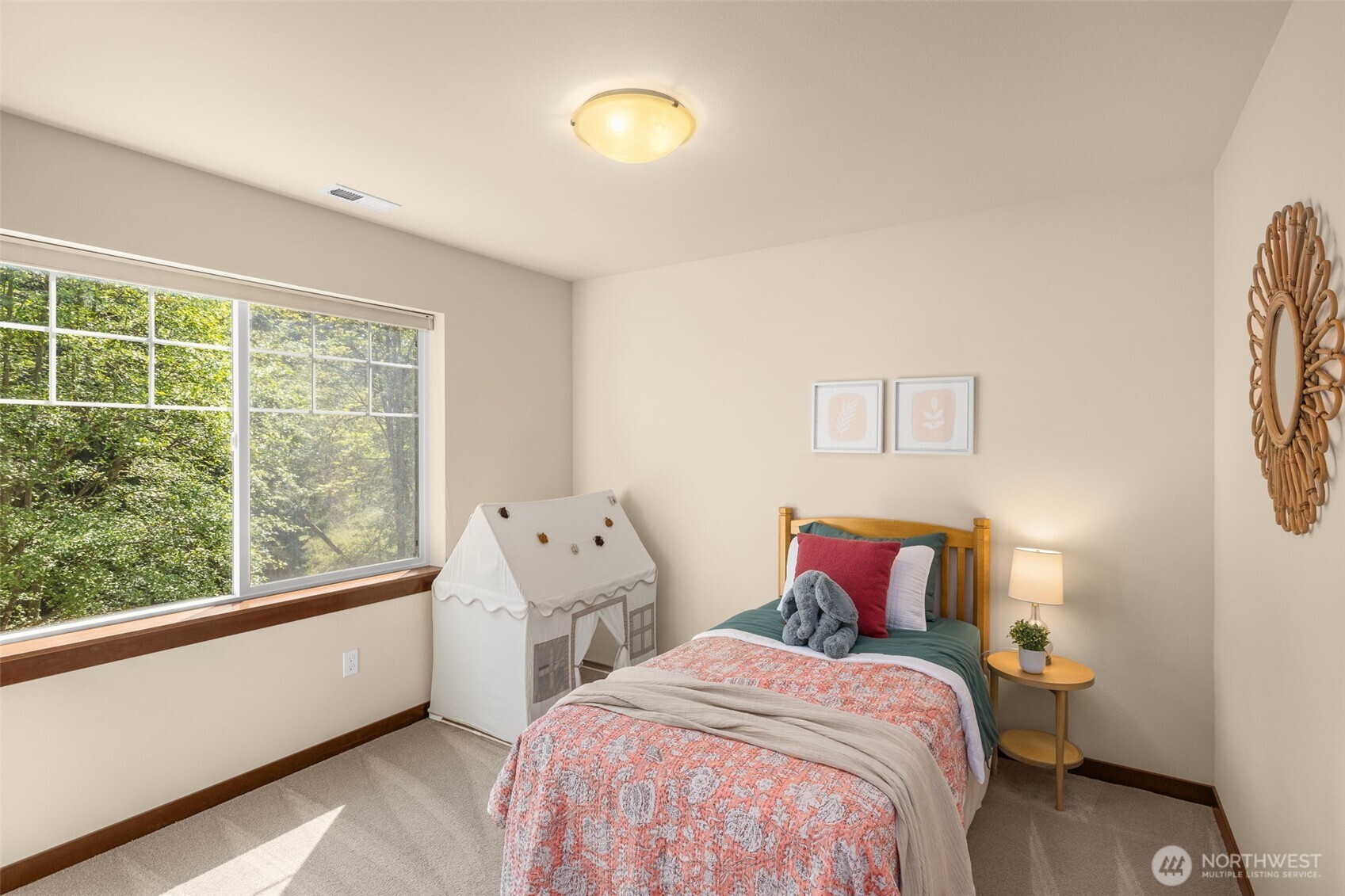 4610 Maltby Road Bothell, WA 98021 - Photo 23 of 39 a bedroom with a bed and a window