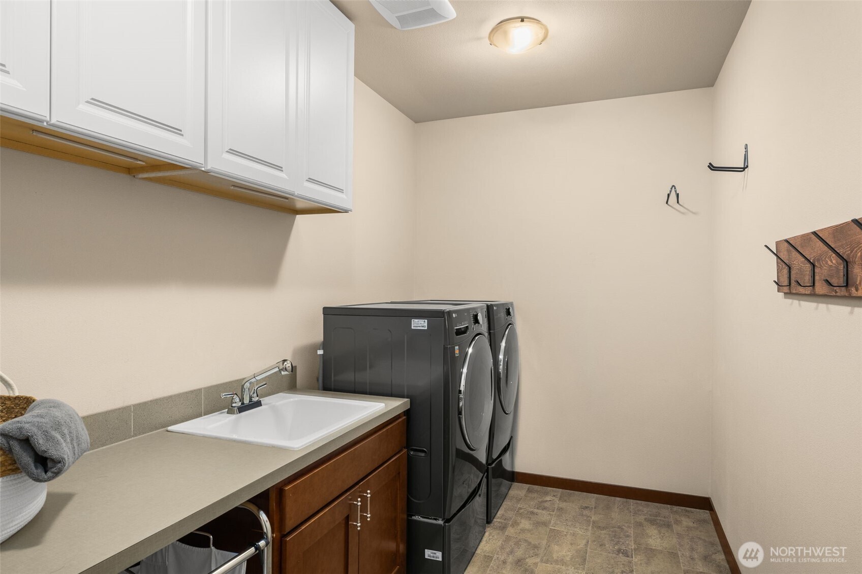4610 Maltby Road Bothell, WA 98021 - Photo 24 of 39 a utility room with cabinets