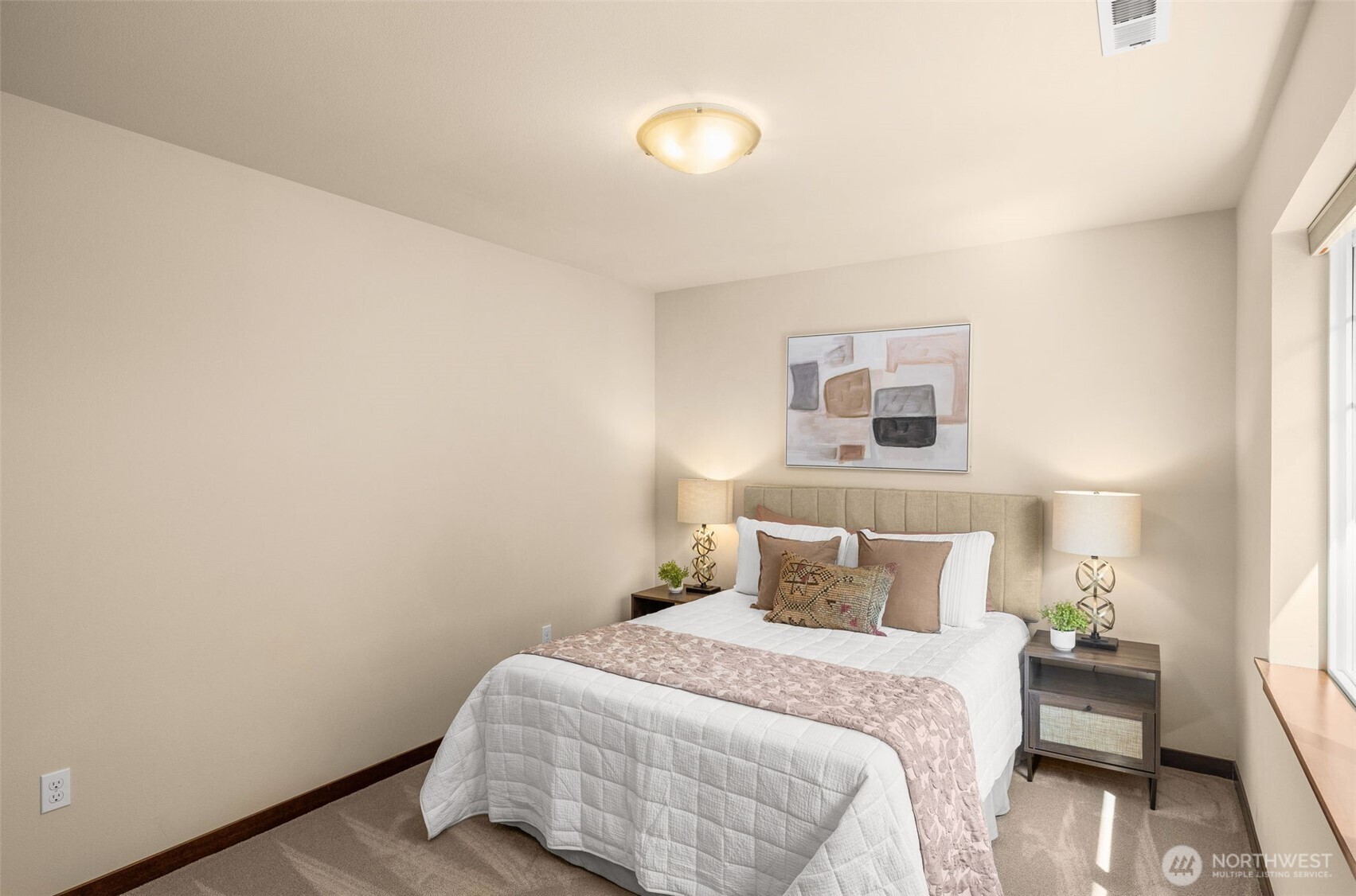 4610 Maltby Road Bothell, WA 98021 - Photo 25 of 39 a bedroom with a bed and a night stand