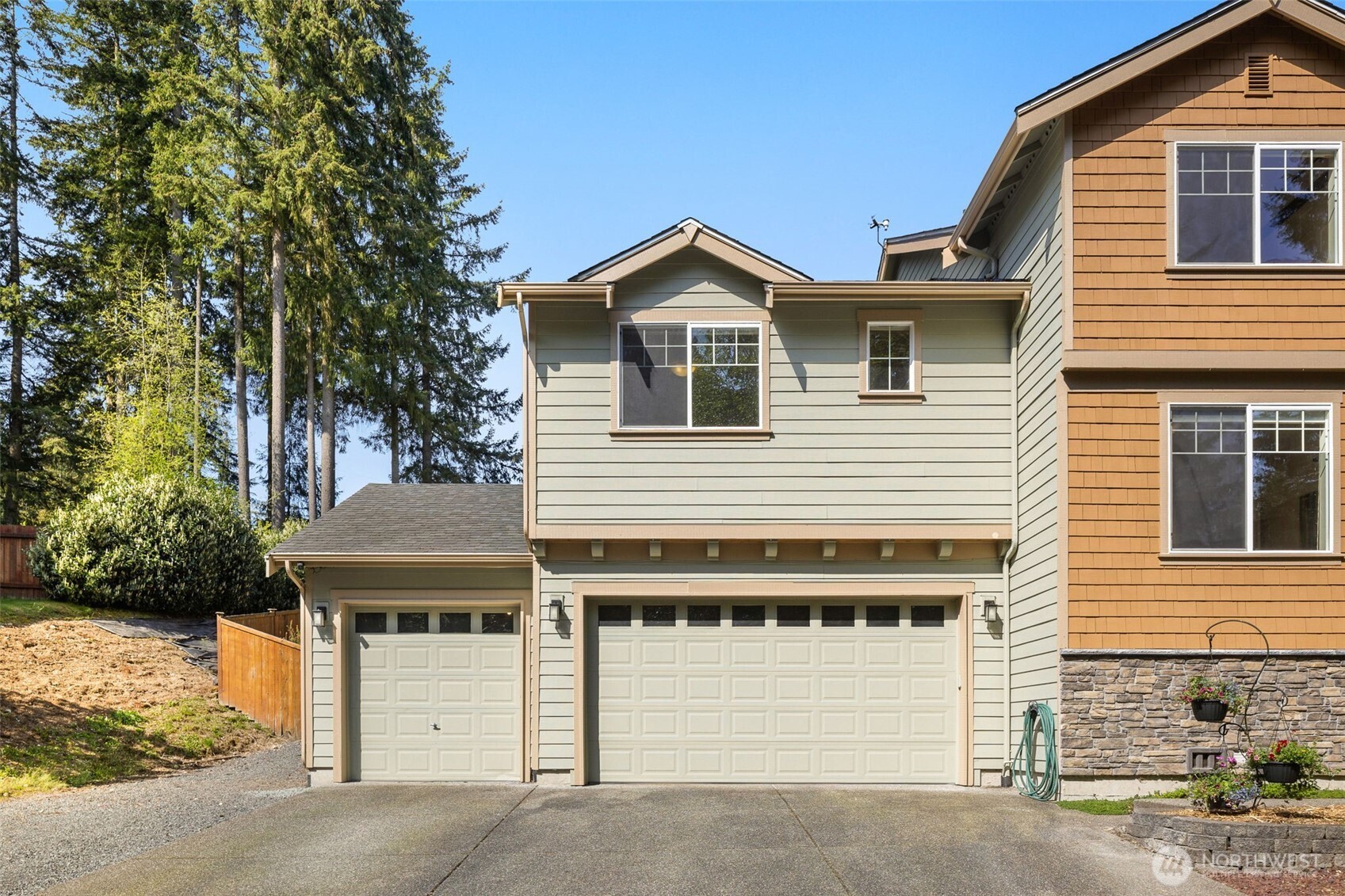4610 Maltby Road Bothell, WA 98021 - Photo 3 of 39 a front view of a house with a garage