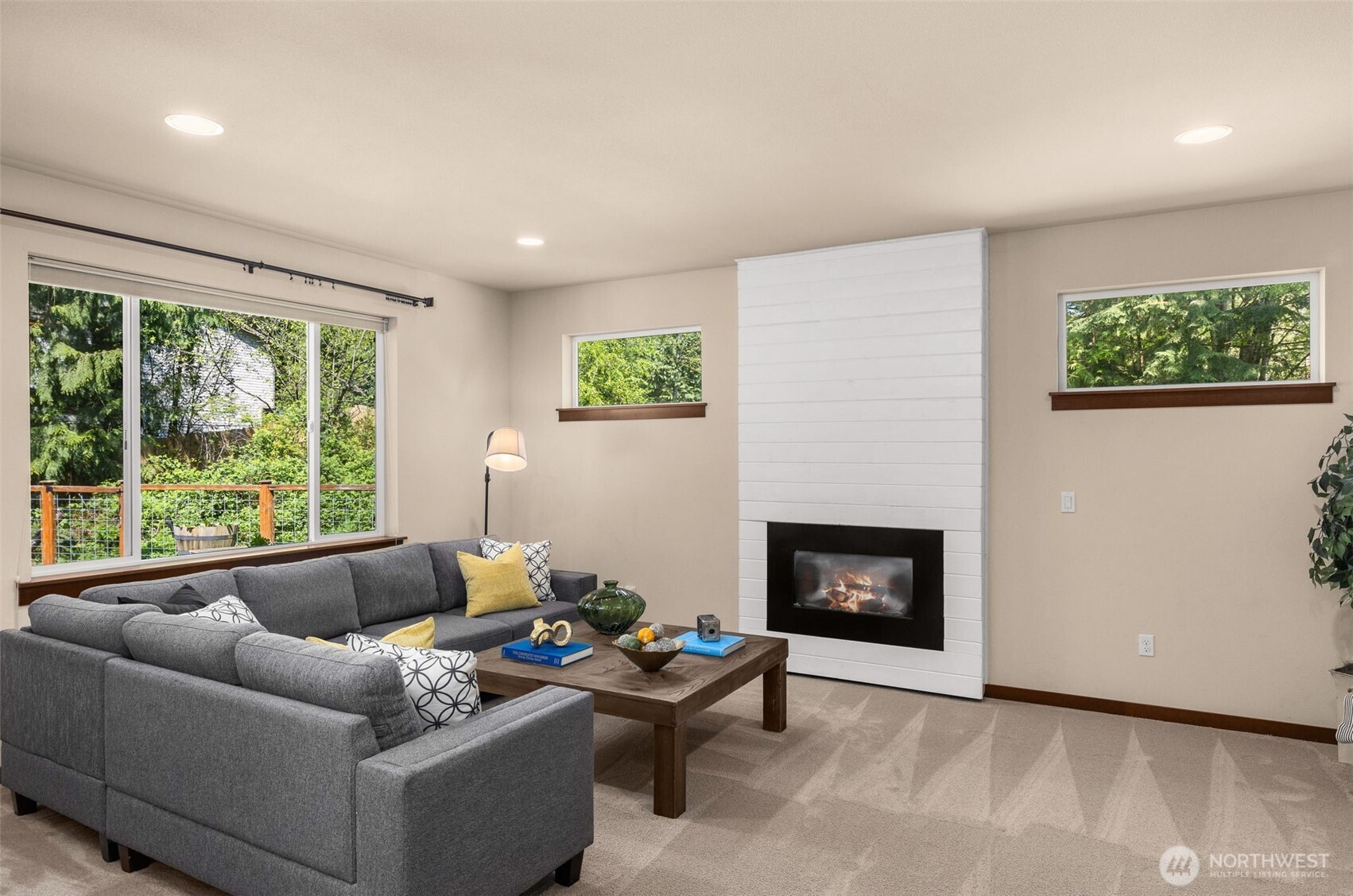 4610 Maltby Road Bothell, WA 98021 - Photo 7 of 39 a living room with furniture and a fireplace