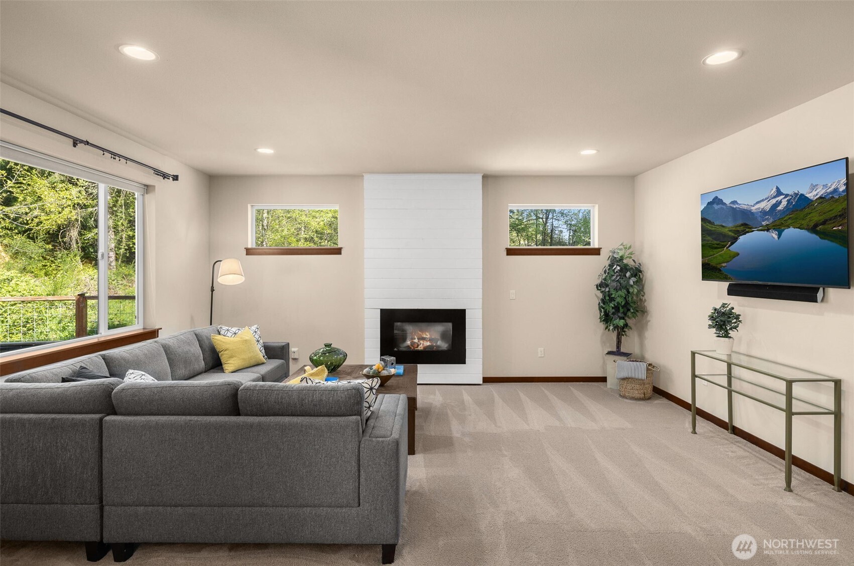 4610 Maltby Road Bothell, WA 98021 - Photo 8 of 39 a living room with furniture and a fireplace