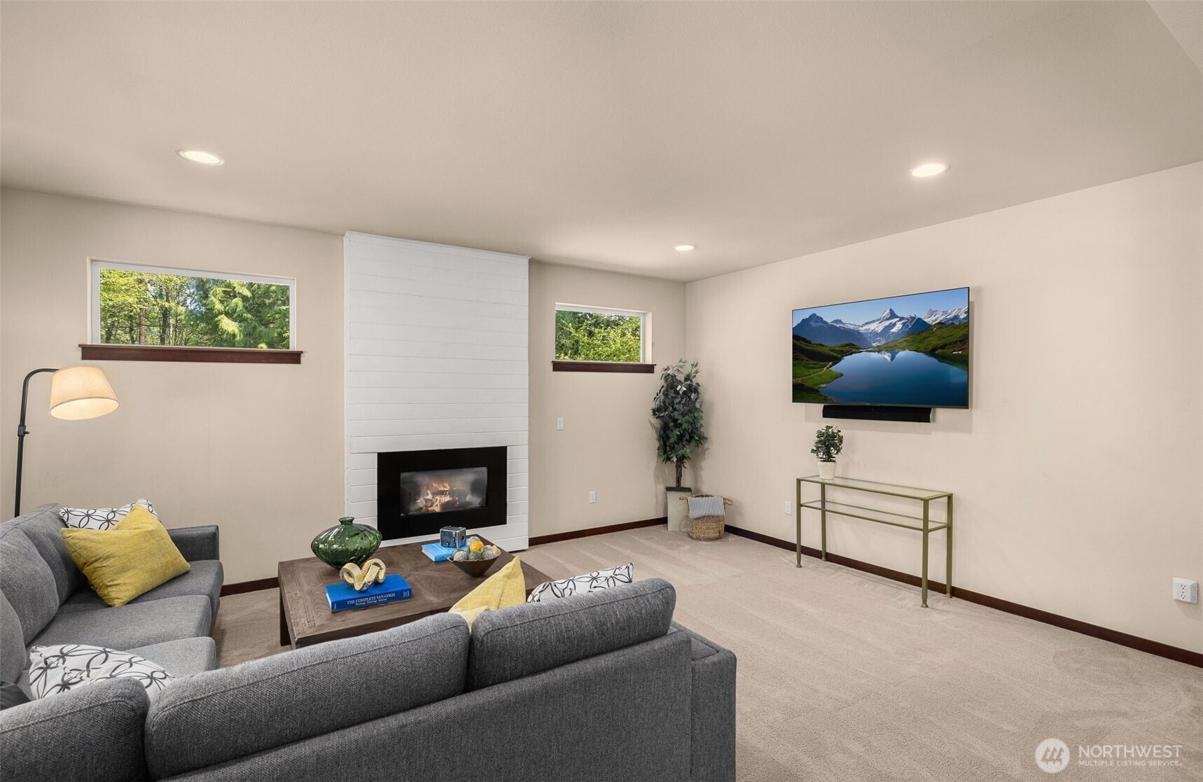 4610 Maltby Road Bothell, WA 98021 - Photo 9 of 39 a living room with furniture and a flat screen tv