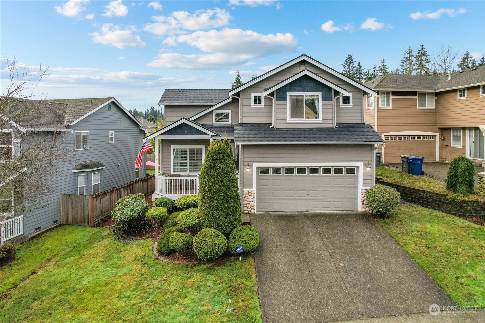 118 203rd Street Southeast Bothell, WA 98012 - Photo 1 of 35 a front view of a house with a garden and plants