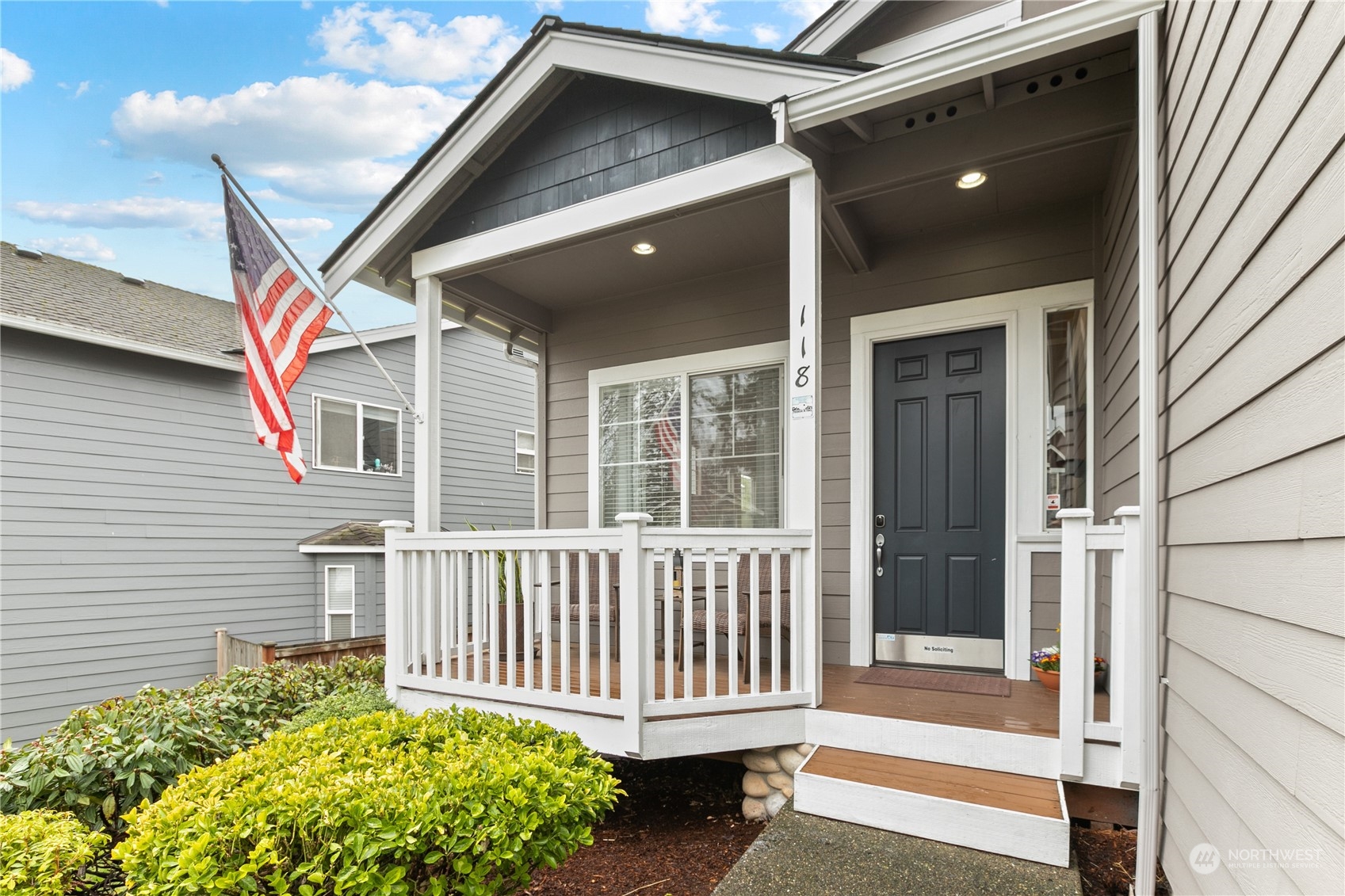 118 203rd Street Southeast Bothell, WA 98012 - Photo 3 of 35 a view of porch with a bench