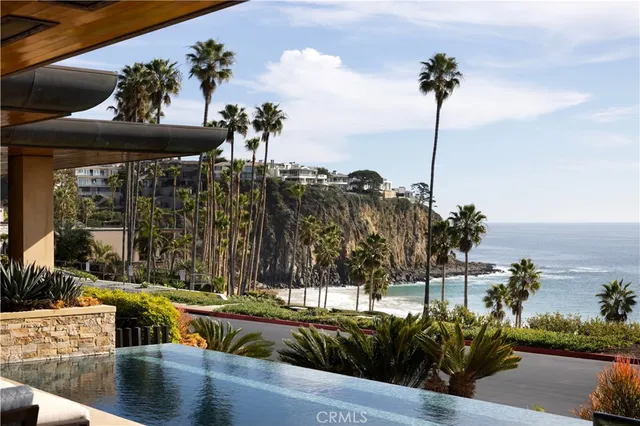 a view of swimming pool with a patio